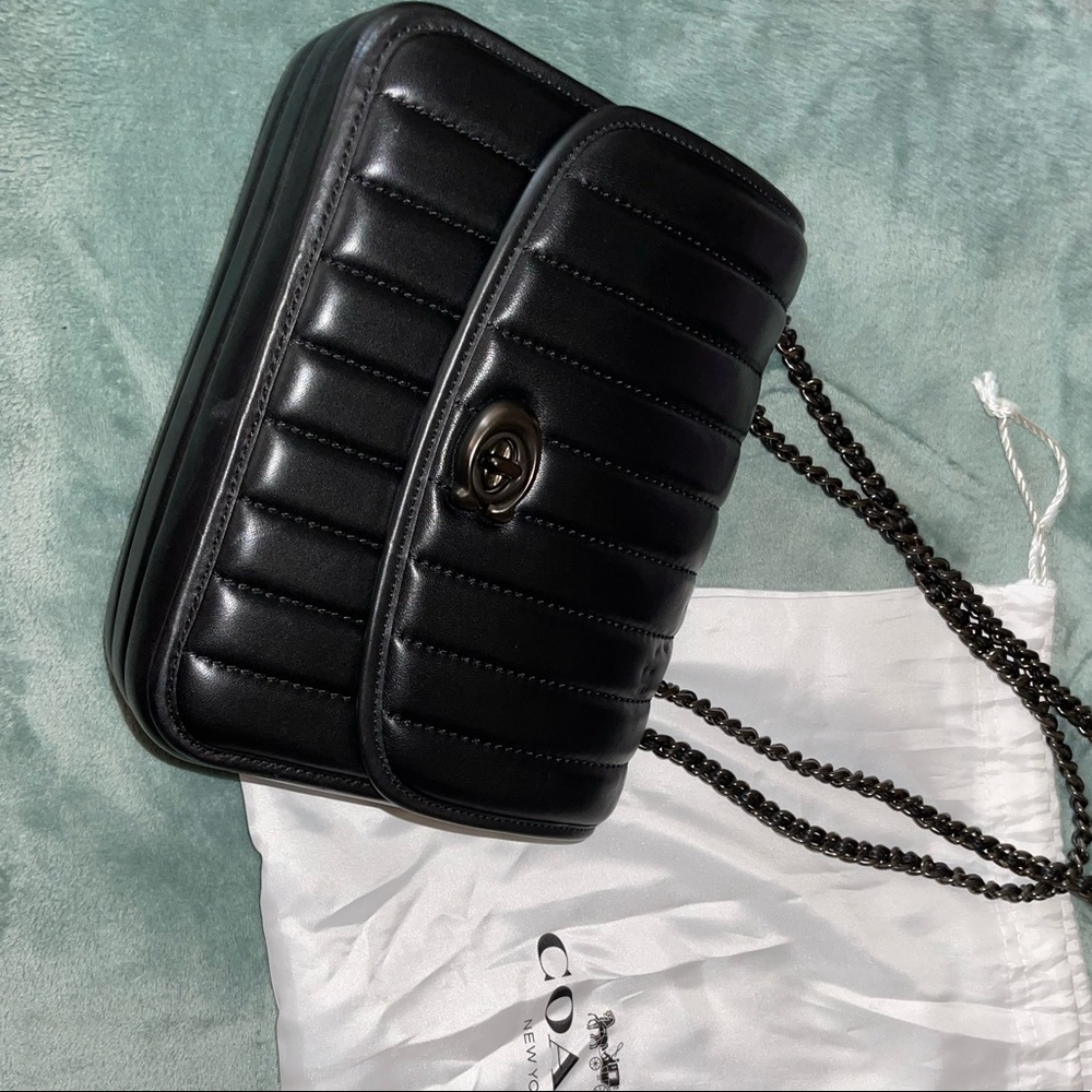 Black leather chain handle Coach bag very good condition.